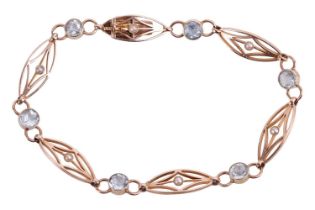 An Edwardian aquamarine and seed pearl bracelet, composed of six circular cut aquamarine in collet