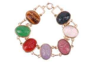 A scarab link bracelet set with multi-gemstones, including tiger's eye, chalcedony, rhodonite,