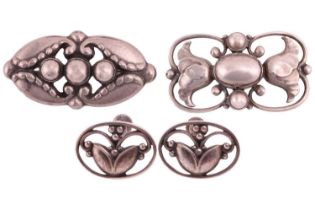 Georg Jensen - two brooches and a pair of screw-back earrings; including a 'Moonlight Blossom'
