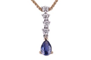 A sapphire and diamond set drop pendant. The pear-shaped diamond weighs 0.43cts, suspended by four