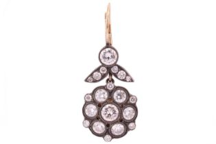 A single diamond set earring conversion, featuring rub-over set round brilliant cut diamonds with