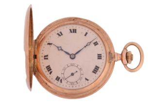 A 9ct rose gold full hunter pocket watch, featuring a Swiss-made keyless wound movement in the 9ct