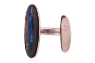 Georg Jensen - a dress ring with polished labradorite, comprises an open shank with a flat long oval