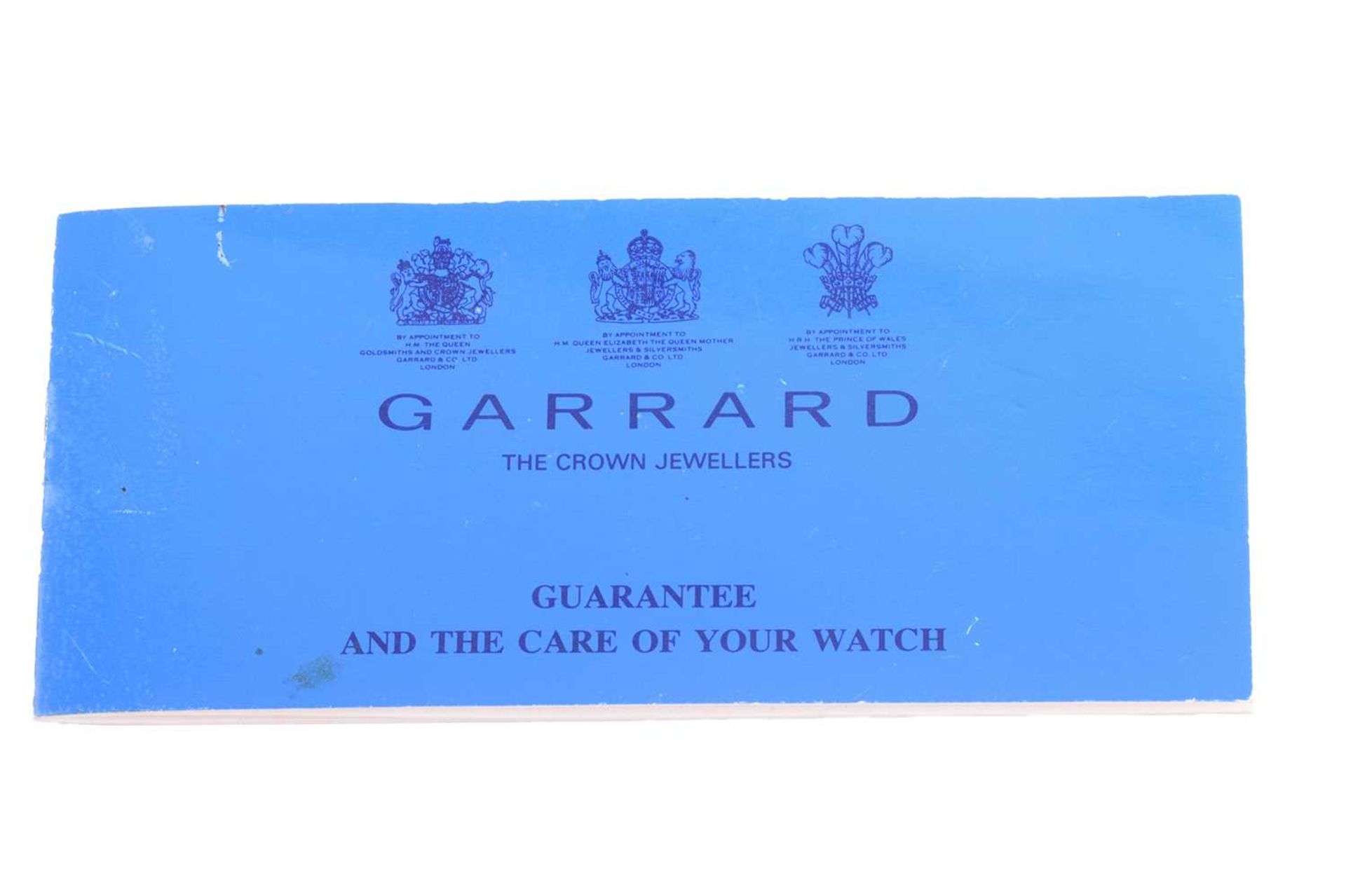 A Garrard & Co 9ct Gentleman's Mechanical Wristwatch Model: 48888 Serial: S76/28 Year: 1995 Case - Image 10 of 11