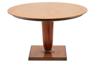 A 20th century Italian, circular tulip-wood effect breakfast table, with a segmented top, on a