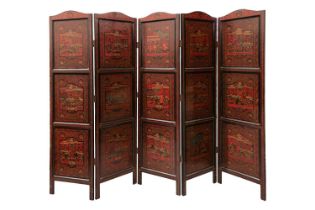 A Burmese black and red lacquered five-fold boudoir screen each panel decorated with scenes of