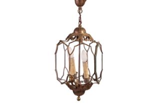 A George III style gilt brass portico lantern, 20th century, fitted three sconces and eight-shaped