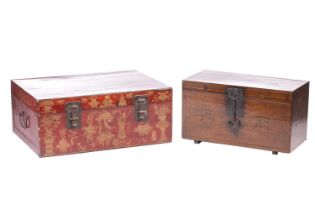 A large Chinese lacquered and painted leather dowry chest painted with gilt flowers and a pair of