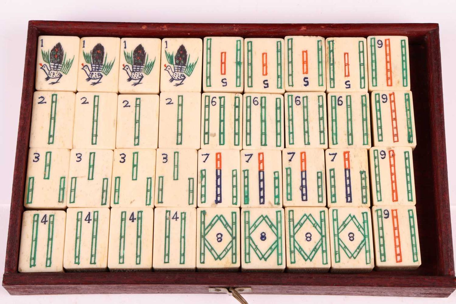 A Chinese rosewood-cased mahjong set with bone and bamboo tiles the sliding door bearing the word - Image 8 of 10