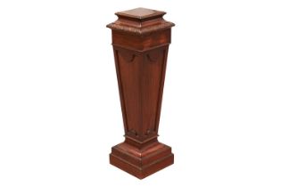 An Edwardian mahogany square section pedestal of Neo-Classical form with decorative carved and