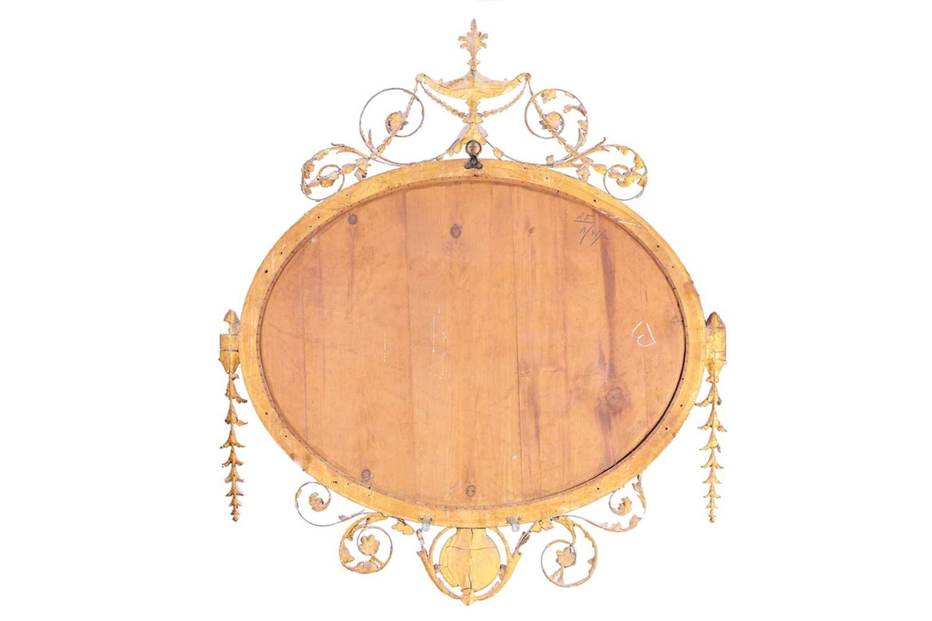 An Edwardian carved and gilt gesso oval overmantel mirror with urn surmount and swag decoration. 109 - Image 2 of 2