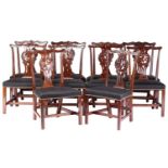 A matched set of ten Chippendale style, George III and later mahogany dining chairs, leaf-capped