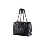 Chanel - a Grand Shopping Tote in black diamond-quilted caviar leather, circa 2014, structured