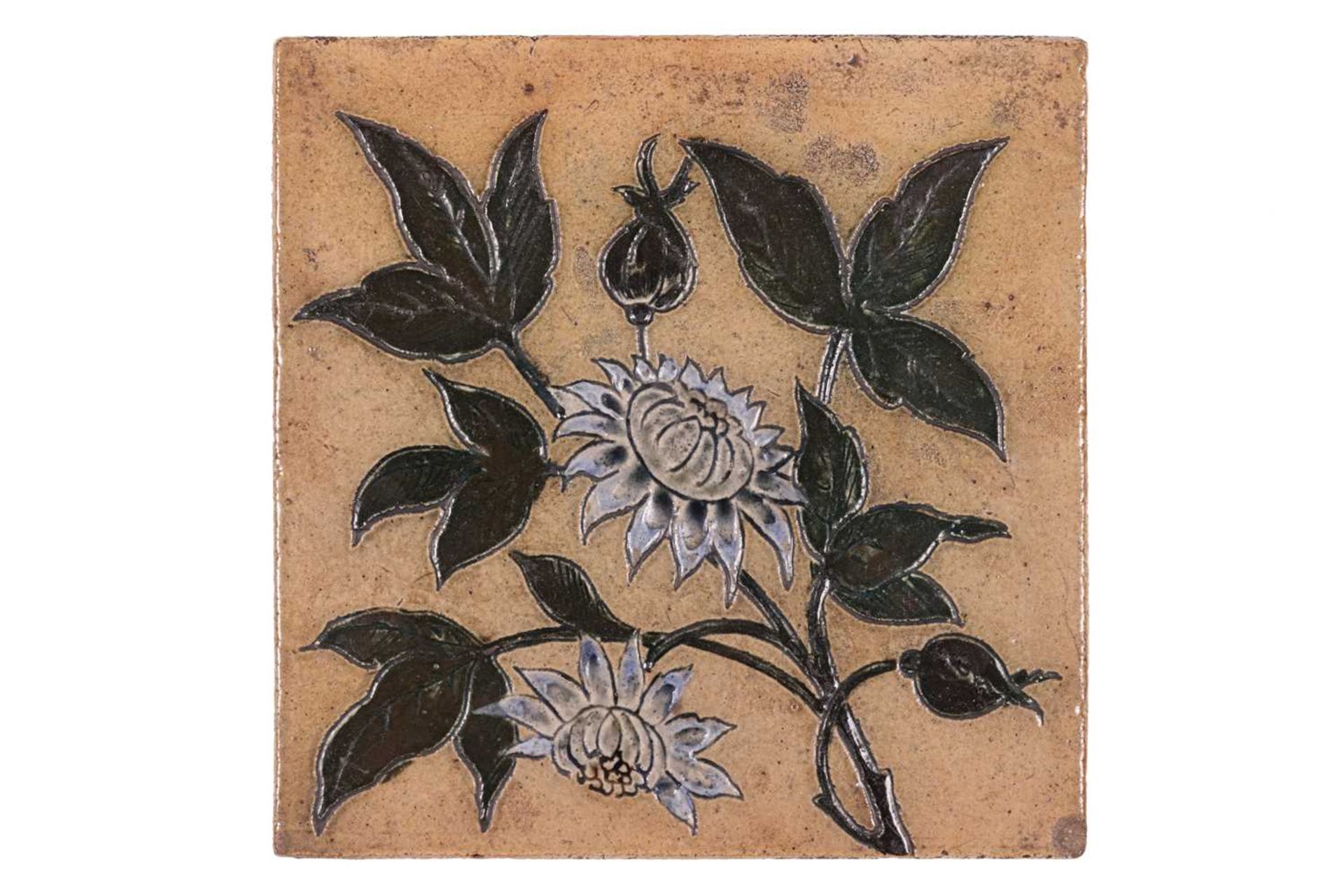 A 19th-century stoneware tile, probably by Martin Brothers (unsigned), with incised floral