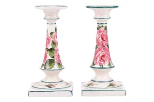 A pair of Wemyss pottery candlesticks, early 20th century, of inverted tapering cylindrical form