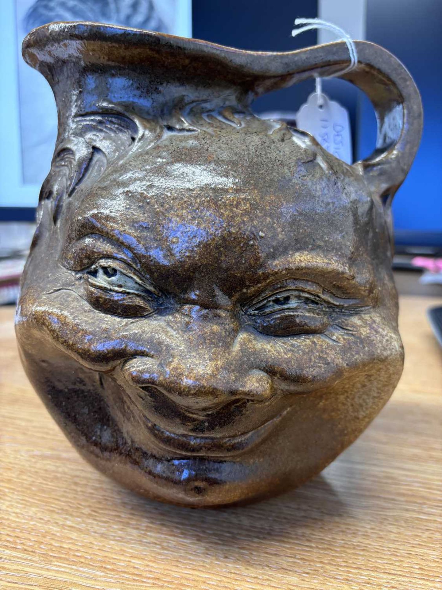 A large Martin Brothers stoneware grotesque face jug, by Robert Wallace Martin, each side - Image 11 of 28