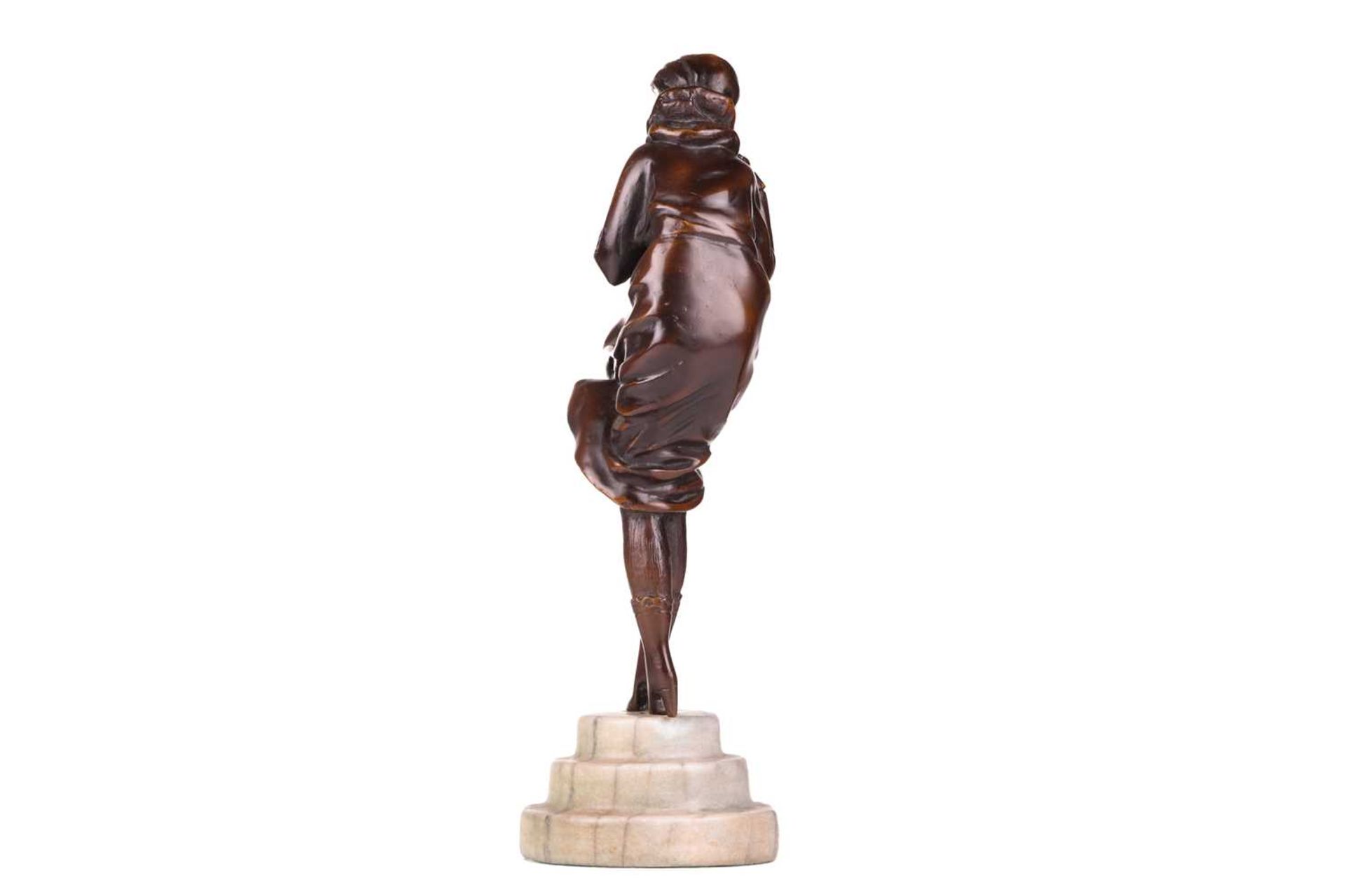 Manner of Demetre Chiparus (1886-1947), an Art Deco style patinated bronze figure of a lady - Image 4 of 6