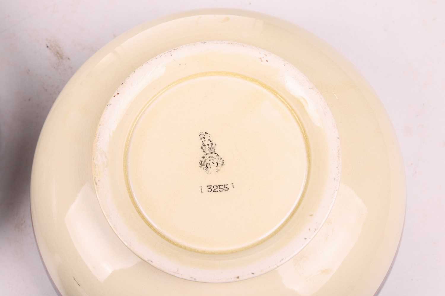An early 20th-century Royal Doulton open bowl, shape number 7562, mythical beast decoration to the - Image 5 of 8