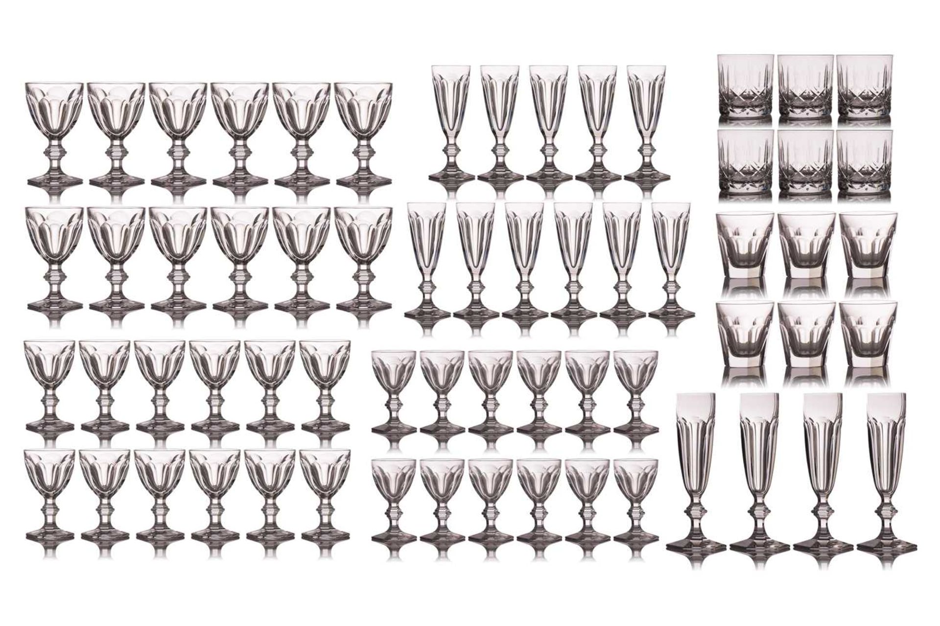 A large suite of Baccarat Harcourt pattern glassware, comprising champagne flutes, red wine glasses,