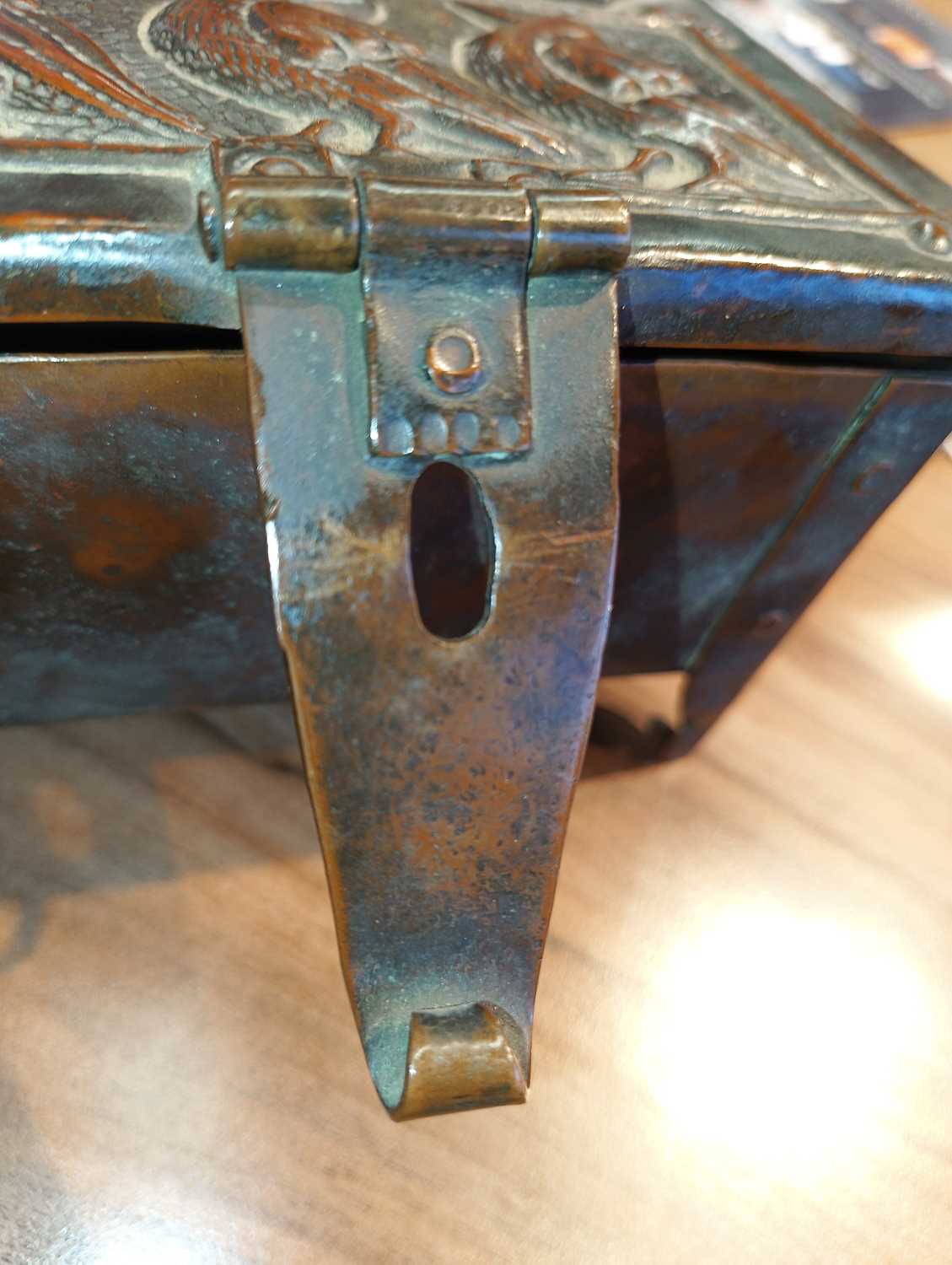 An Arts and Crafts Newlyn copper table box by John Pearson, of rectangular form on four feet, with - Image 8 of 16