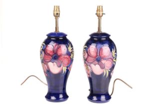 A pair of Moorcroft large baluster-form lamp bases, in the Anenome pattern, tube-lined decoration on