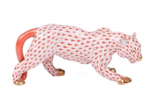 A Herend porcelain figure of a leopard, red painted and gilt-highlighted, numbered 5366/VH 6 H94,