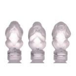 A contemporary Lalique frosted glass set of three paperweights, modelled as the three wise