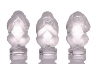 A contemporary Lalique frosted glass set of three paperweights, modelled as the three wise