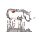 A Baccarat crystal glass figure of a rhinoceros, 8.5 cm x 18.5 cm, in original box.