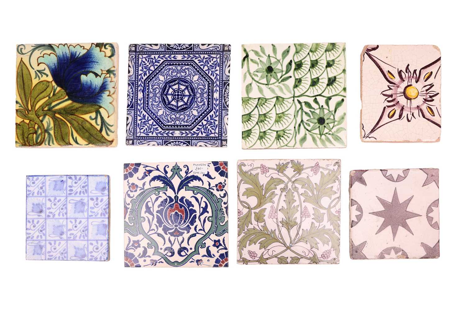 A collection of decorative tiles, 19th century and later, to include examples by Wedgwood,