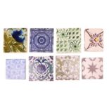 A collection of decorative tiles, 19th century and later, to include examples by Wedgwood,