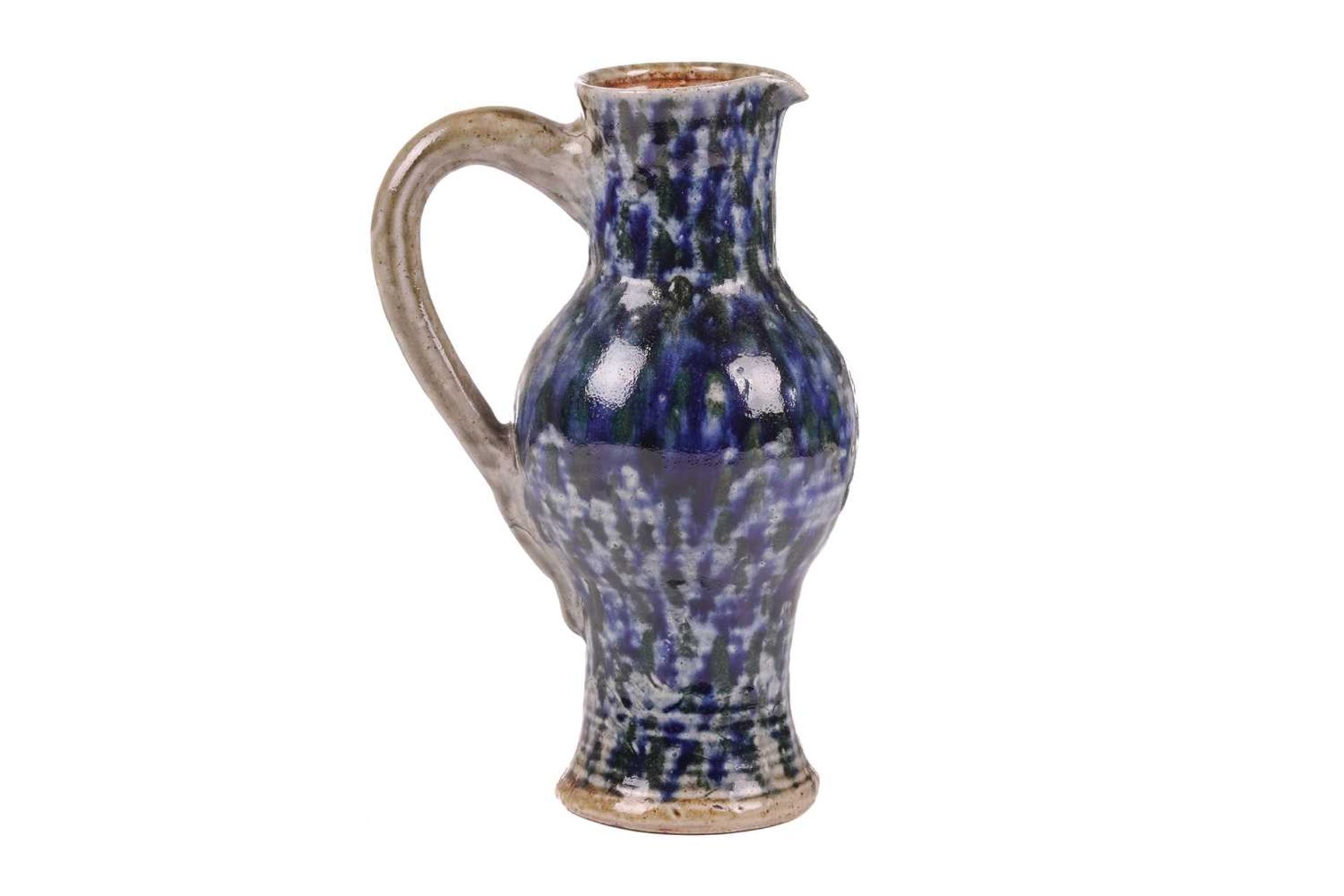 A late 19th century Martin Brothers stoneware jug, of bellied form with mottled blue glaze on a - Image 3 of 12