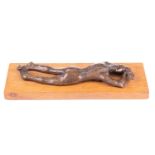 John Doubleday (b.1947), a patinated bronze study of a recumbent female nude, lying face down, on