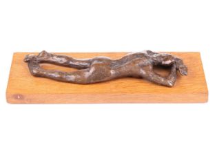 John Doubleday (b.1947), a patinated bronze study of a recumbent female nude, lying face down, on