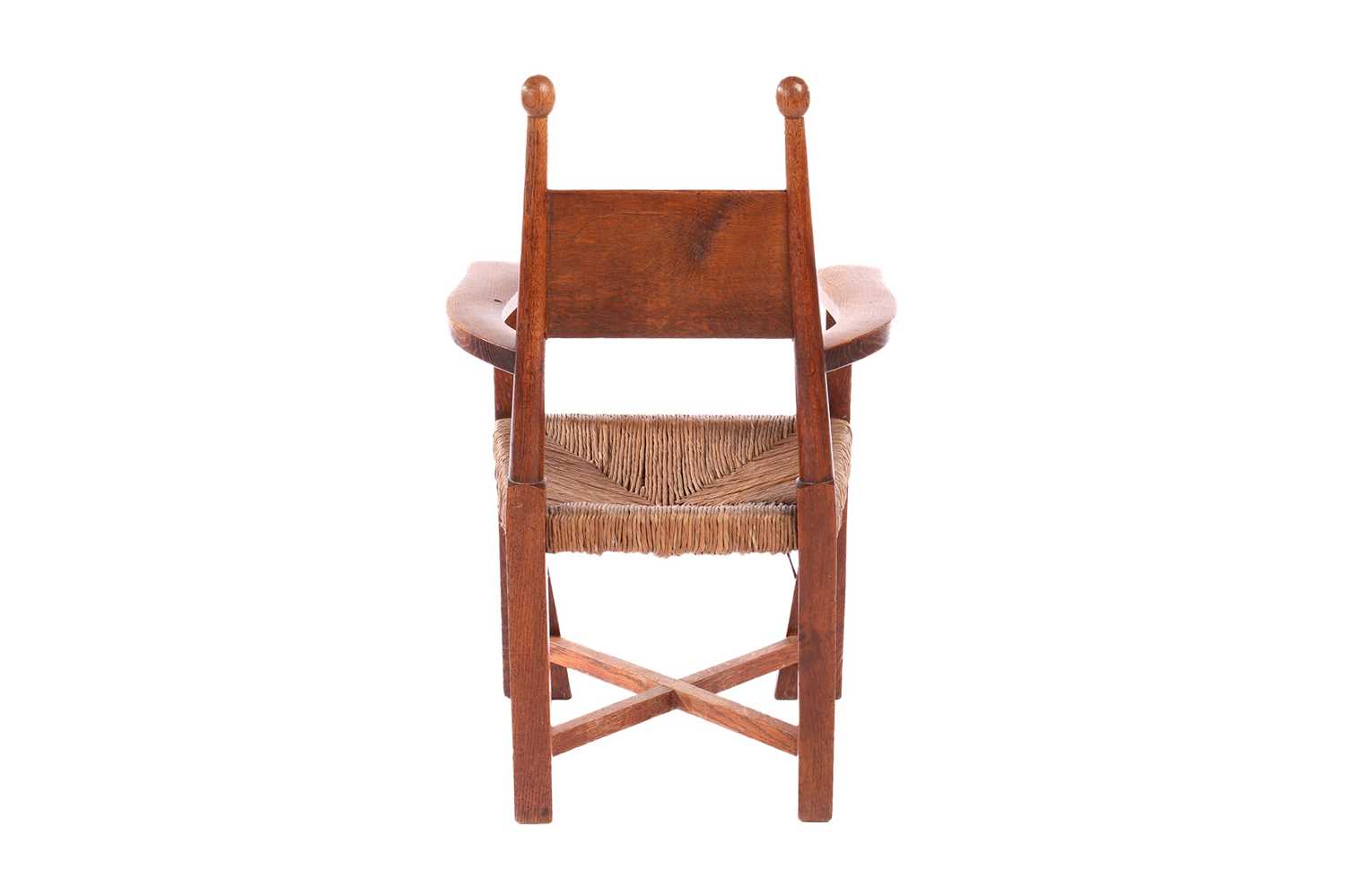 An Arts & Crafts oak rush-seated child's chair, probably designed by E.J. Punnett for William - Image 4 of 12