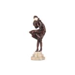 Manner of Demetre Chiparus (1886-1947), an Art Deco style patinated bronze figure of a lady