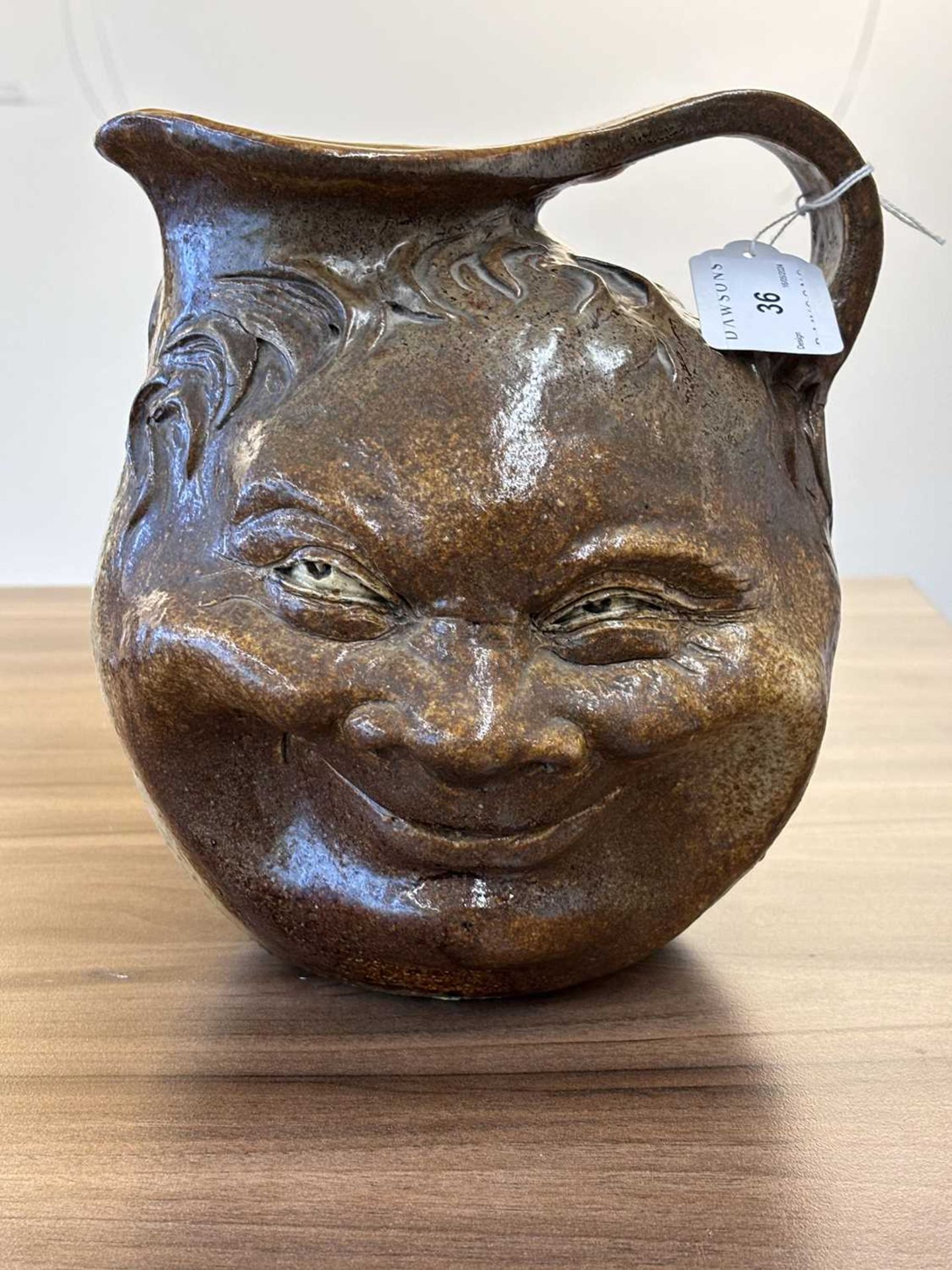 A large Martin Brothers stoneware grotesque face jug, by Robert Wallace Martin, each side - Image 27 of 28
