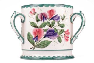 A large Wemyss pottery tyg, with sweetpea decoration, 'Made in Scotland for W. Rowland & Son