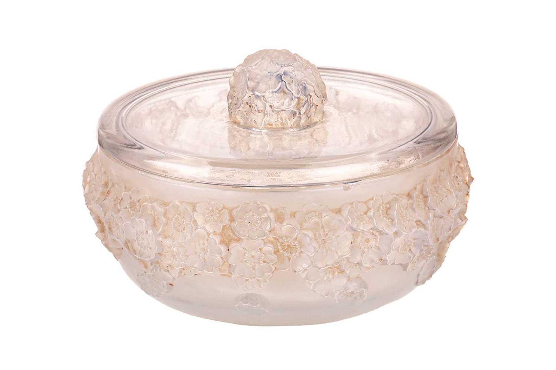 A Rene Lalique 'Primeveres' pattern moulded and frosted circular powder bowl and cover, the body
