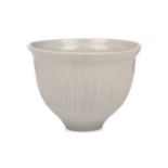 David Leach (1911-2005), a pale celadon green footed bowl, of ribbed design, indistinct impressed