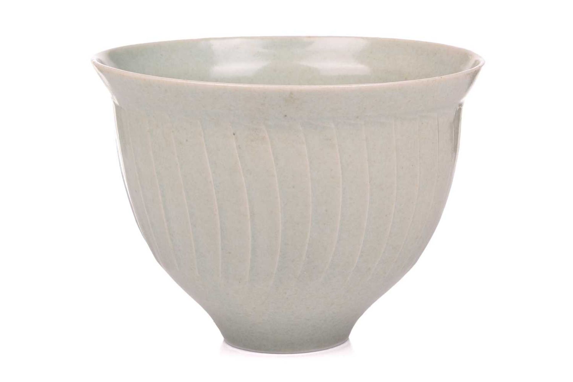 David Leach (1911-2005), a pale celadon green footed bowl, of ribbed design, indistinct impressed