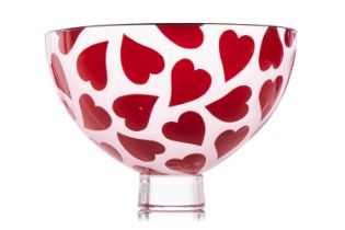 A Gillies Jones art glass bowl, with red heart decoration on a circular foot, etched signature to