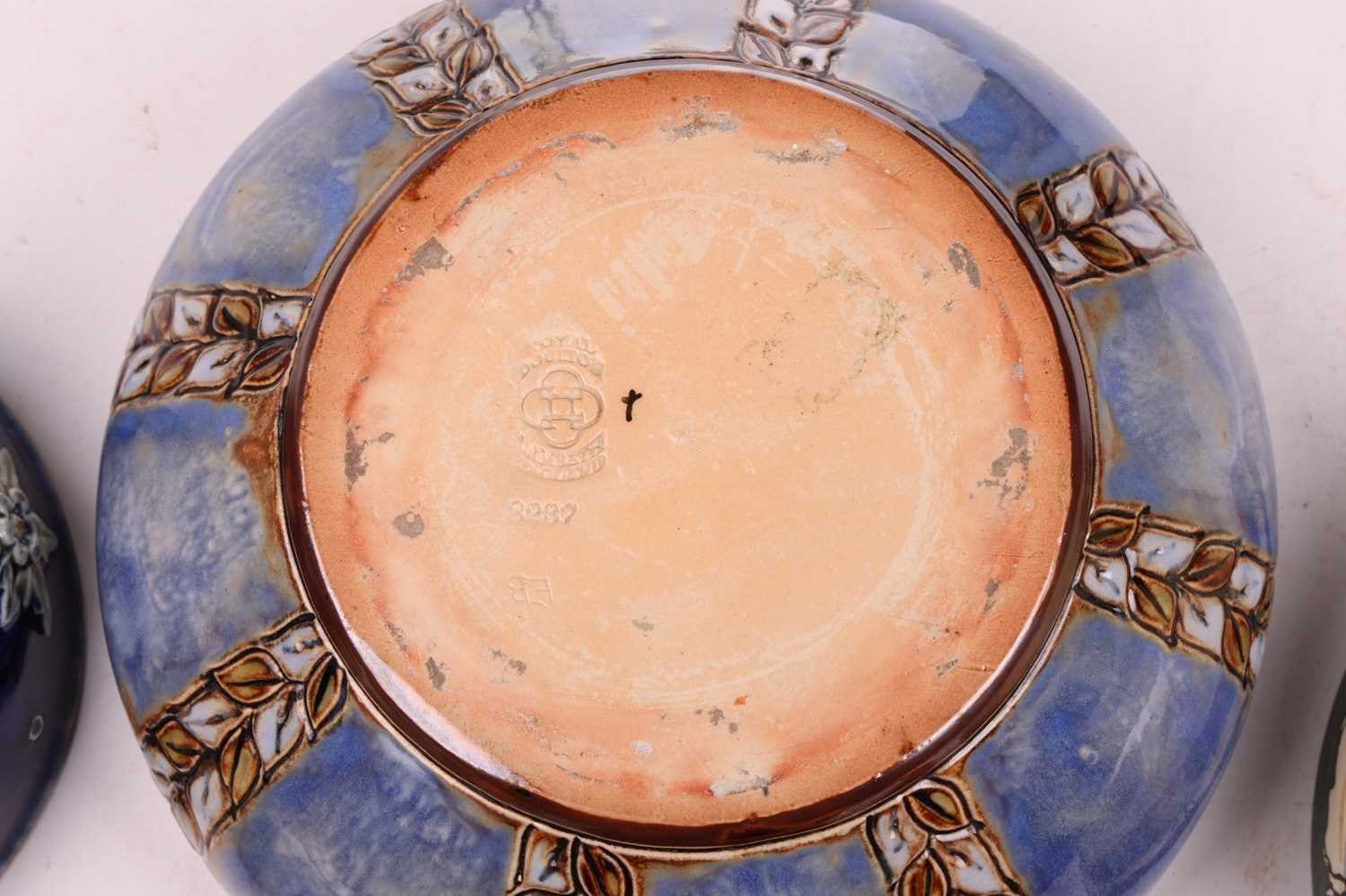 An early 20th-century Royal Doulton open bowl, shape number 7562, mythical beast decoration to the - Image 6 of 8