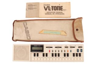 A Casio VL-Tone VL-1 Keyboard, with original carry pouch and operation manual, from the personal