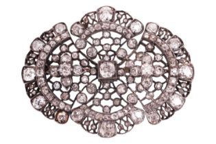 A Victorian diamond brooch, set with an array of old cut and rose cut diamonds, with a total
