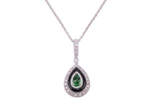 A tsavorite garnet, onyx and diamond pendant, the drop shape pendant set to the centre with a pear-