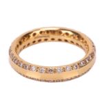 A diamond-set band, the 4mm yellow gold band featuring chamfered edges set with round brilliant diam