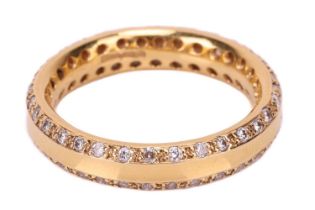 A diamond-set band, the 4mm yellow gold band featuring chamfered edges set with round brilliant