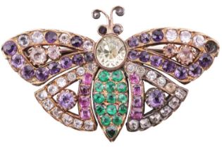 A late Victorian gem-set butterfly brooch, consisting of a circular-cut chrysoberyl thorax and an