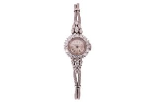 A Patek Philippe 3289 diamond set lady's cocktail watch Model: 3289/34 Platinum Serial: 985.153